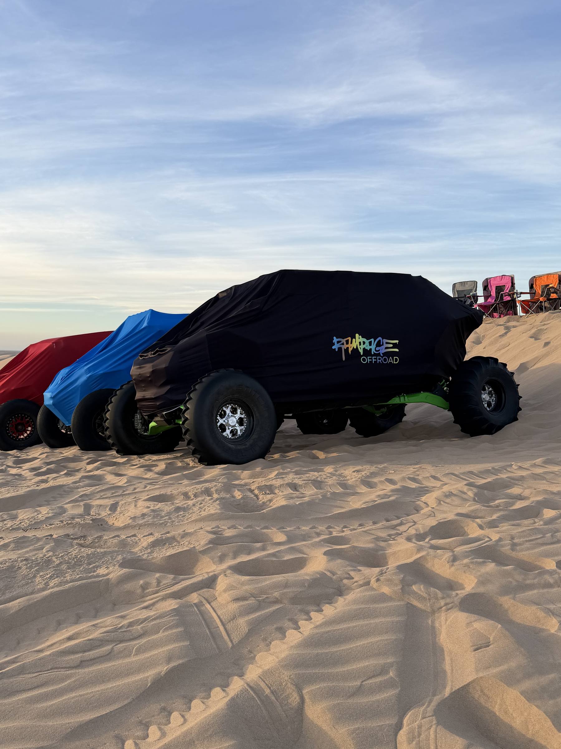 Red and blue covers sunset dunes